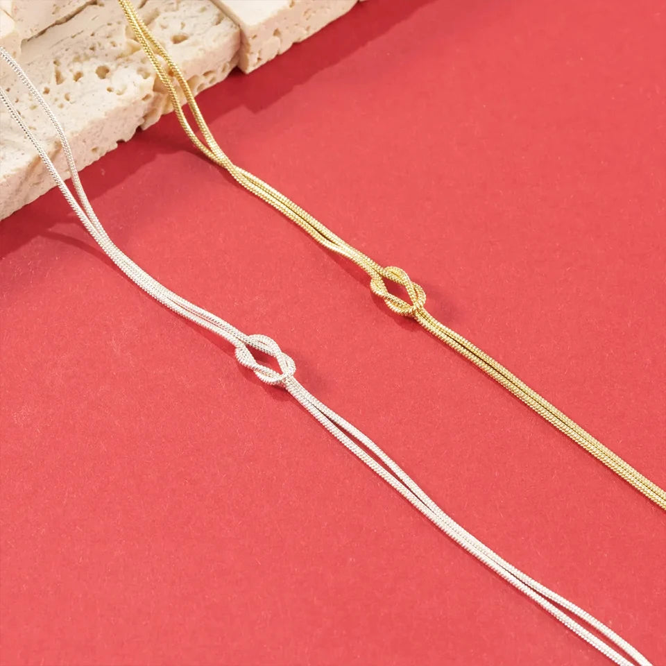 Partnerarmband Eternal Knot Edelstahl – Gold & Silber